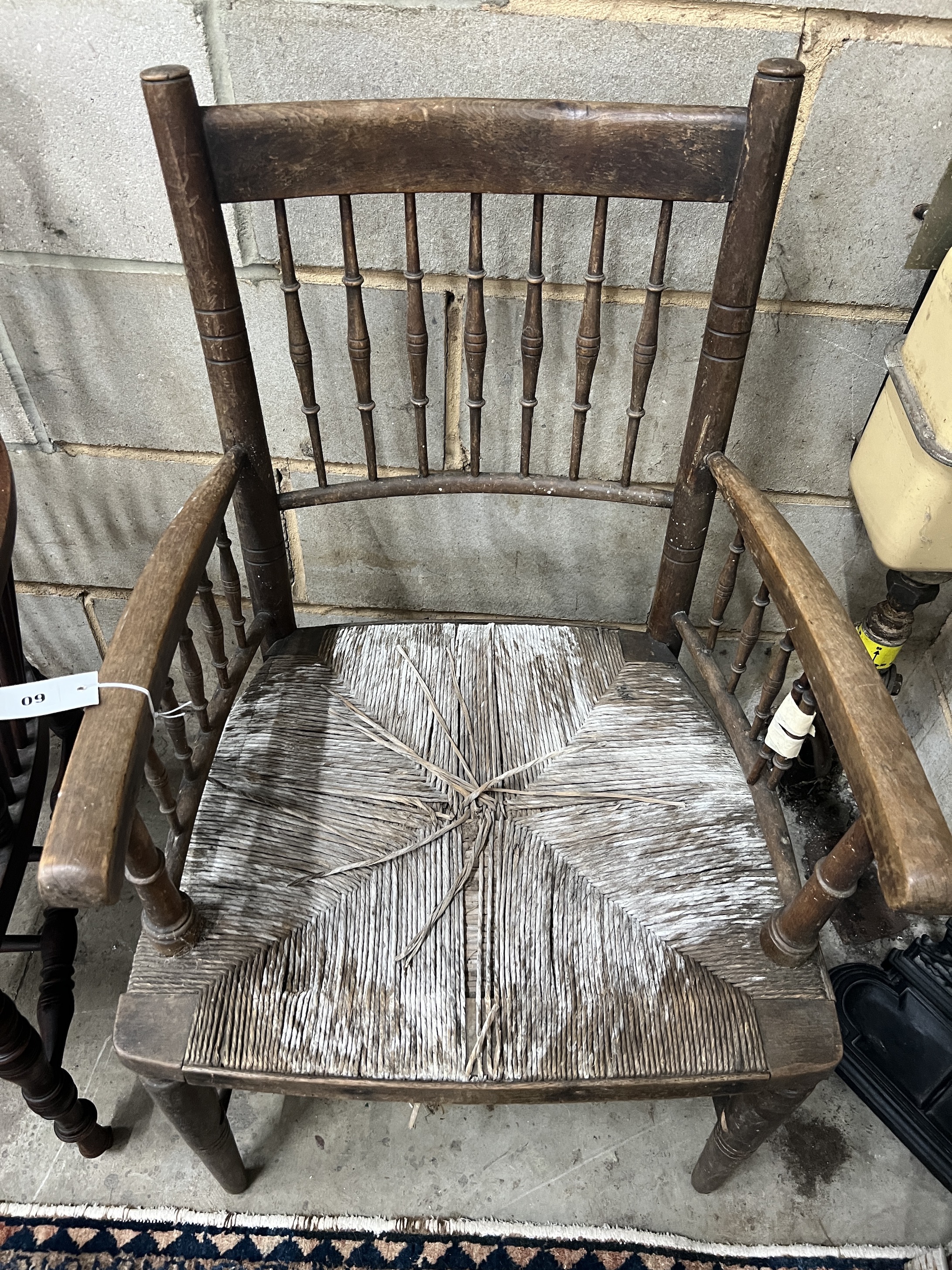 A 19th century Sussex elbow chair, width 52cm, depth 46cm, height 90cm